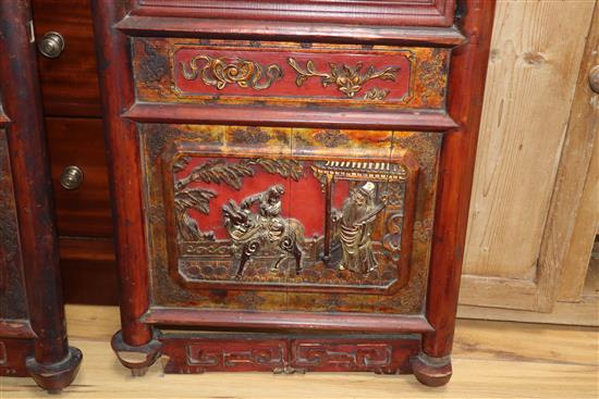 A pair of 19th century Chinese carved wood and glazed panels W.41cm